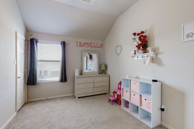 carpeted bedroom featuring lofted ceiling