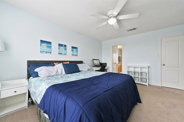 728 Oriole Dr, Saginaw, TX 76131 - bedroom featuring ceiling fan, visible vents, a textured ceiling, and light colored carpet