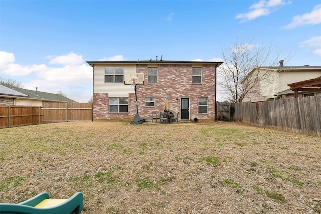 728 Oriole Dr, Saginaw, TX 76131 - rear view of house with a yard, brick siding, a playground, and a fenced backyard
