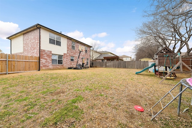 728 Oriole Dr, Saginaw, TX 76131 - view of yard with a playground and a fenced backyard