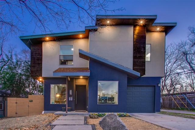 modern home featuring a garage