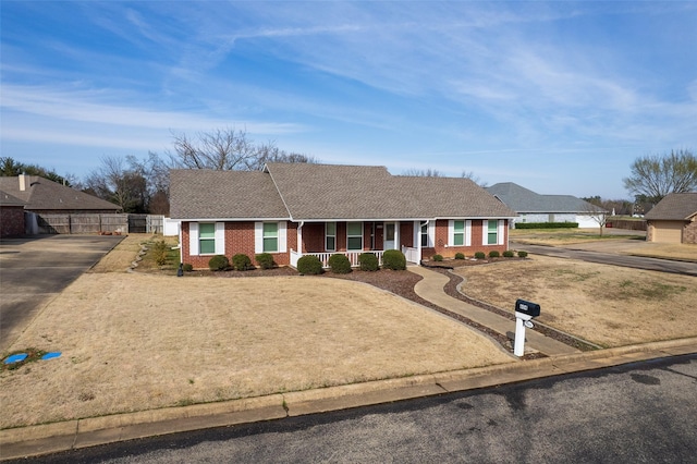 604 Mustang, Mount Vernon, TX 75457 - single story home featuring brick siding, covered porch, and roof with shingles