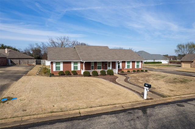 ranch-style home with covered porch