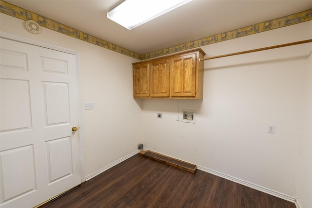 washroom with dark wood-type flooring, cabinets, washer hookup, and electric dryer hookup