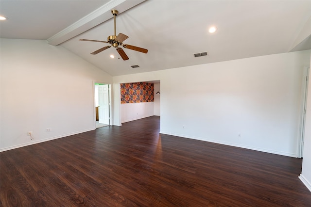 empty room featuring lofted ceiling with beams, dark hardwood / wood-style floors, and ceiling fan