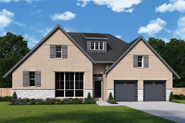 view of front of property featuring a garage and a front yard