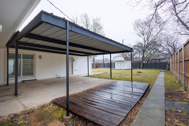 view of patio / terrace featuring a storage shed