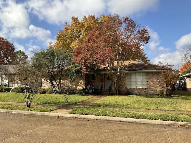 view of front of property with a front yard