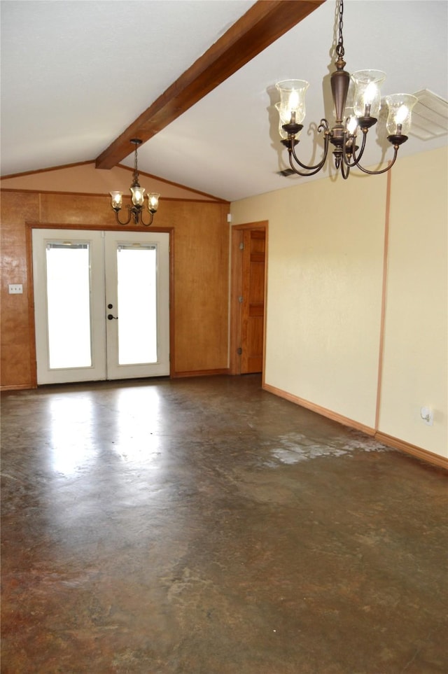interior space with vaulted ceiling with beams, french doors, concrete flooring, baseboards, and a chandelier