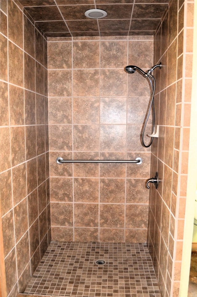bathroom featuring a stall shower