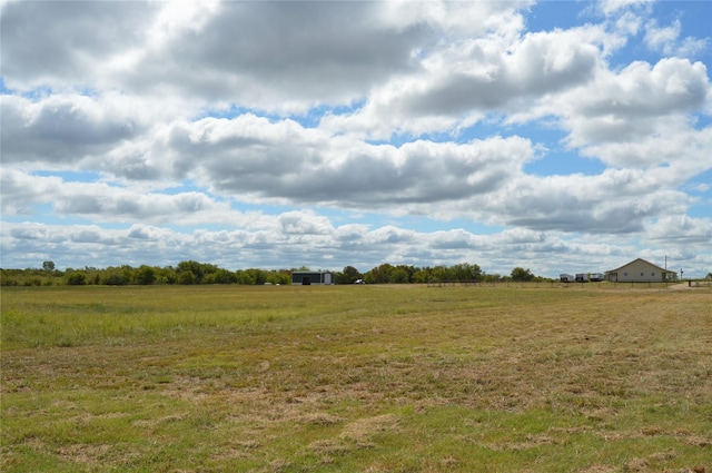 view of landscape with a rural view