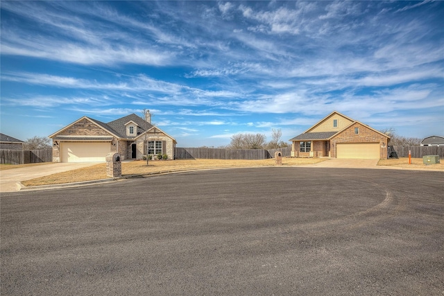 single story home featuring a garage