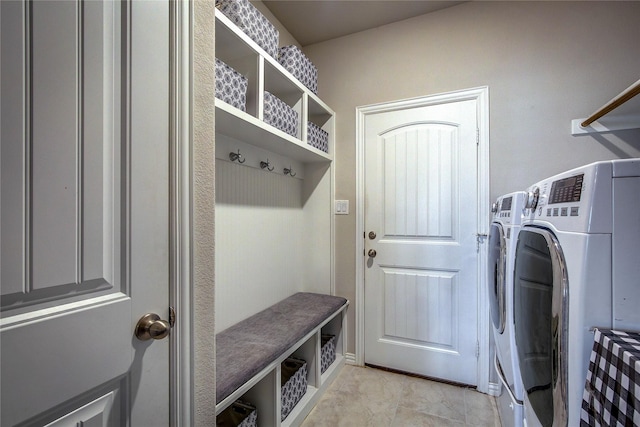 mudroom featuring washing machine and dryer