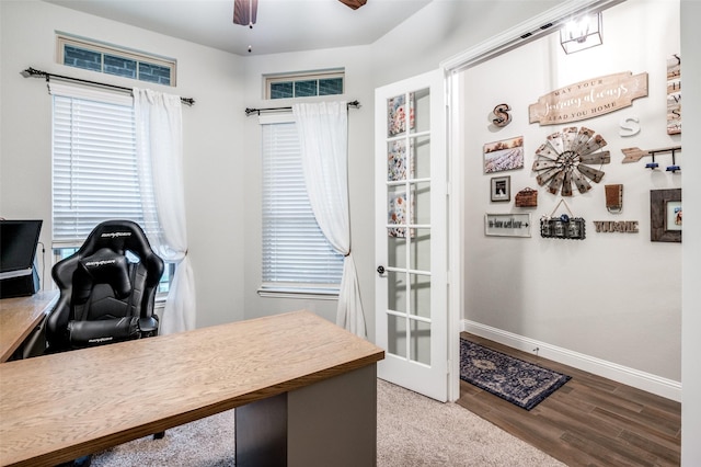 office space featuring hardwood / wood-style floors and ceiling fan