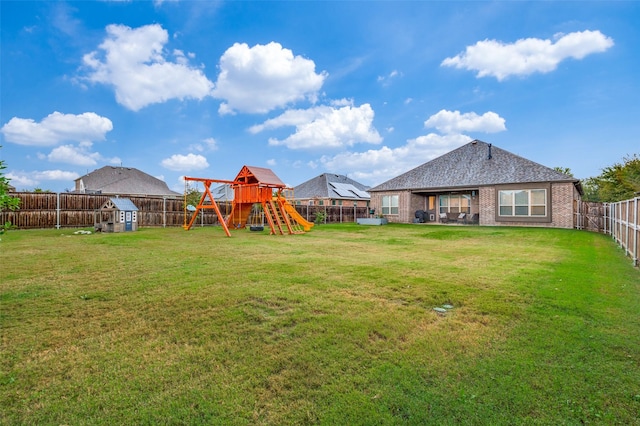 view of yard with a playground