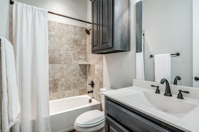 full bathroom with shower / tub combo, vanity, and toilet