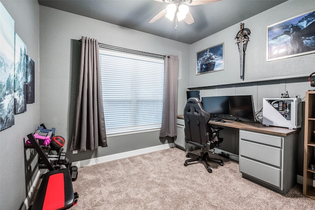 office with light colored carpet and ceiling fan