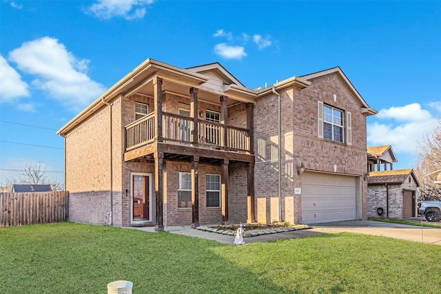 view of front of house with a garage, a balcony, and a front lawn