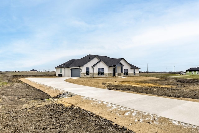 modern inspired farmhouse featuring driveway, a garage, a shingled roof, board and batten siding, and brick siding