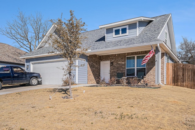 view of front of property featuring brick siding, a shingled roof, concrete driveway, an attached garage, and fence