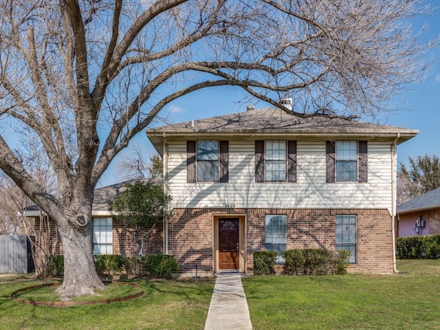 view of front of home with a front lawn