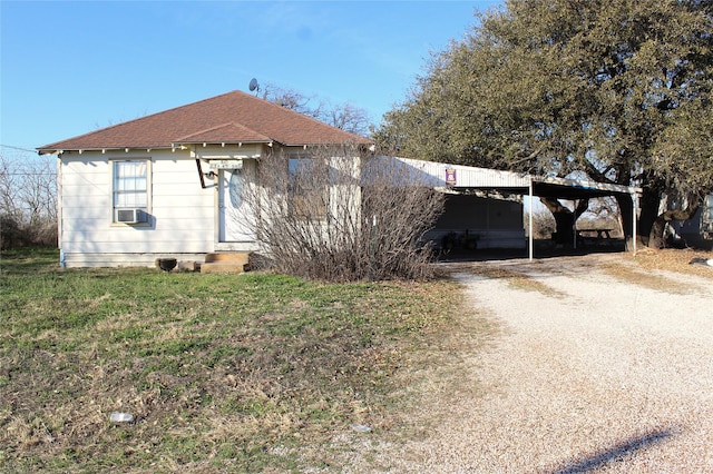 view of front of house featuring a carport