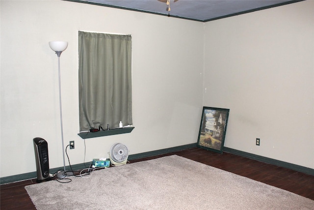 unfurnished room featuring dark hardwood / wood-style flooring