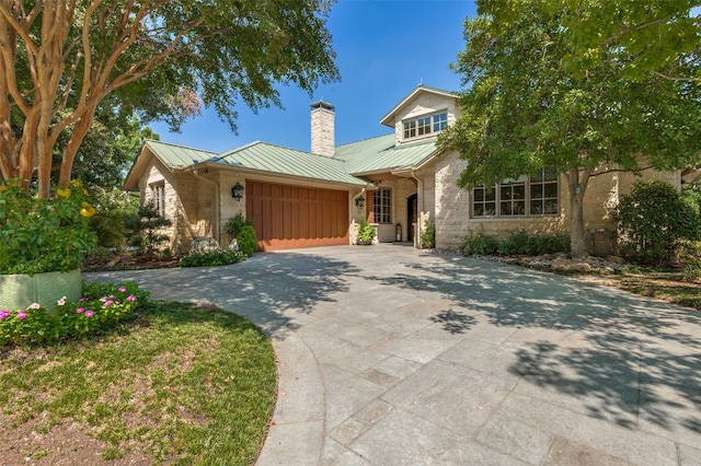 view of front of home with a garage