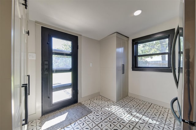 foyer entrance with a healthy amount of sunlight