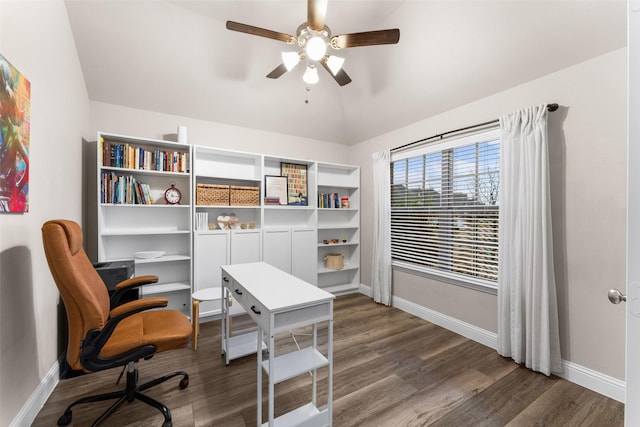 office area featuring dark wood-type flooring, ceiling fan, and vaulted ceiling