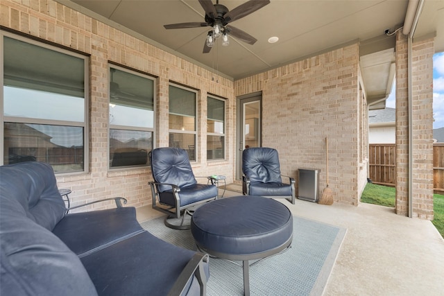 view of patio / terrace featuring ceiling fan