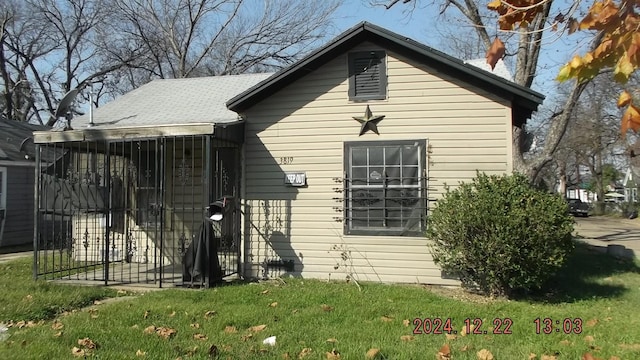 exterior space with a yard