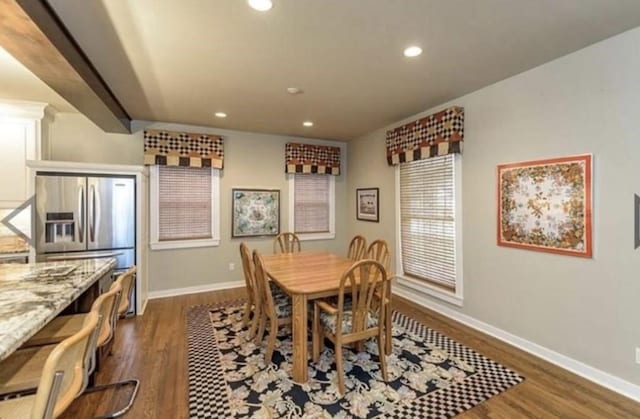 dining room with dark wood-type flooring