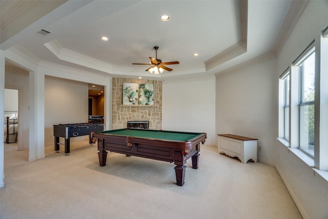 game room featuring a raised ceiling, crown molding, carpet, and pool table