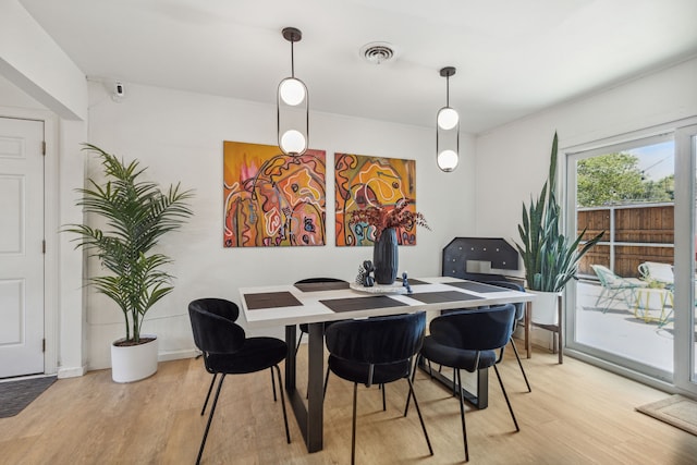 9704 Lanward Dr, Dallas, TX 75238 - dining room featuring wood-type flooring