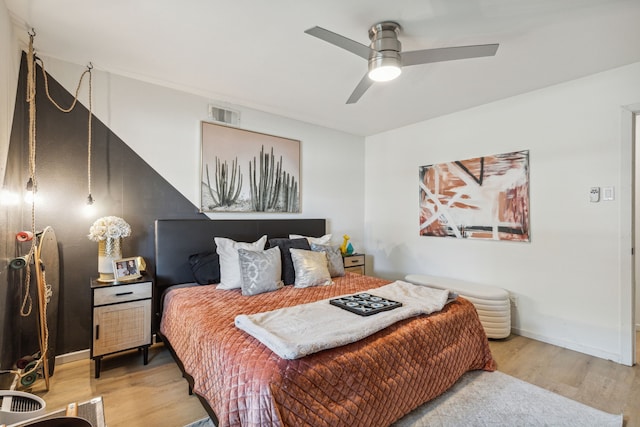 9704 Lanward Dr, Dallas, TX 75238 - bedroom with wood-type flooring and ceiling fan