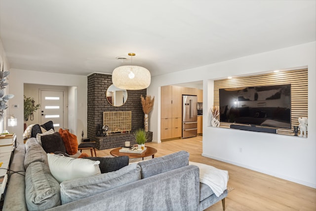9704 Lanward Dr, Dallas, TX 75238 - living room with wood-type flooring and a fireplace
