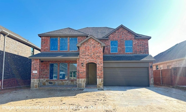 front of property featuring a garage