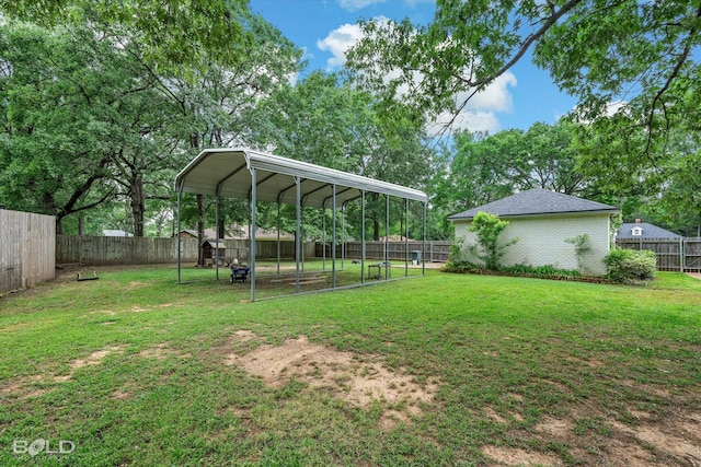 10571 Pineview Cir, Keithville, LA 71047 - view of yard featuring a fenced backyard and a detached carport