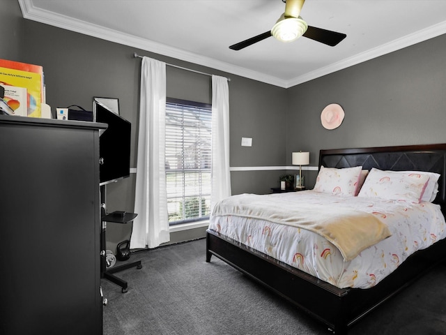 bedroom with a ceiling fan, carpet flooring, and crown molding