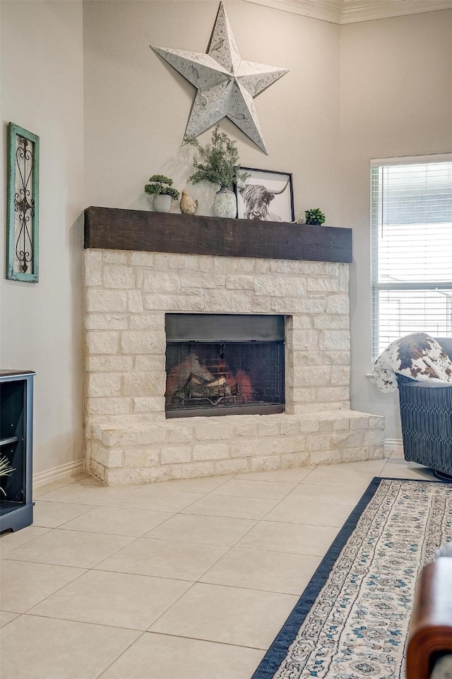 living room featuring crown molding and light tile patterned flooring