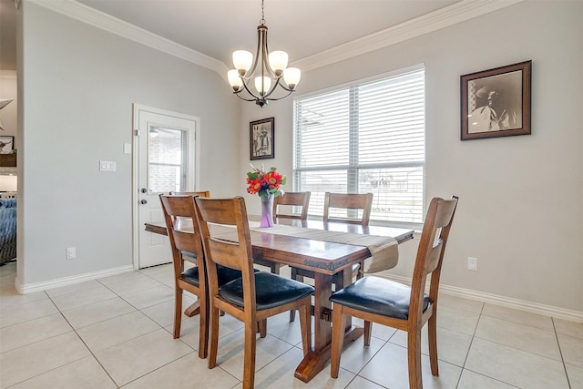 tiled dining space with a notable chandelier and ornamental molding