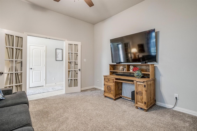 living room with ceiling fan, light colored carpet, and french doors