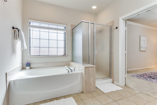 bathroom featuring tile patterned floors and plus walk in shower