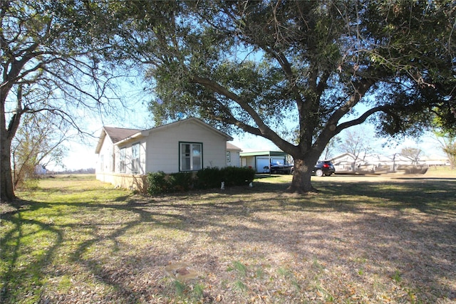 view of property exterior featuring a yard