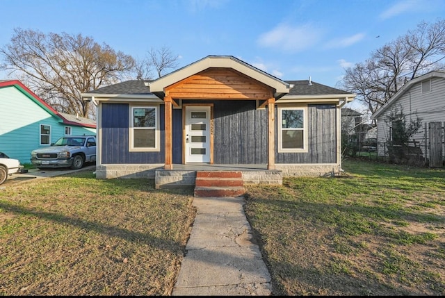 view of front of property with a front lawn