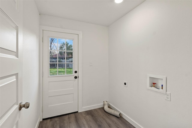 washroom with dark hardwood / wood-style flooring, hookup for a washing machine, and electric dryer hookup