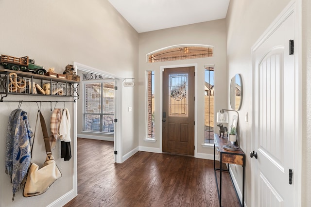 foyer with dark hardwood / wood-style floors