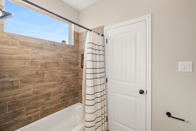 bathroom featuring shower / bath combo