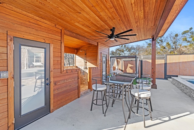 view of patio with ceiling fan